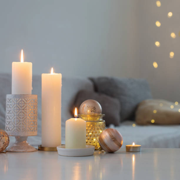 istock Christmas decorations with candles at home 1193045271