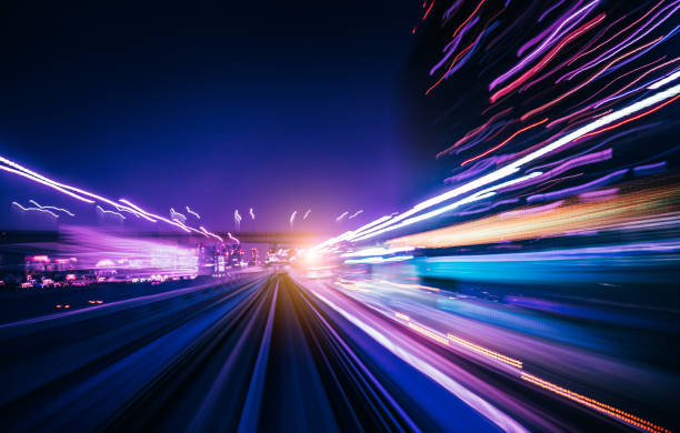 istock Futuristic High Speed Light Tail with Night City Background 1193048616