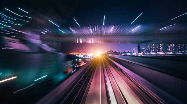 istock Futuristic High Speed Light Tail with Night City Background 1193048662