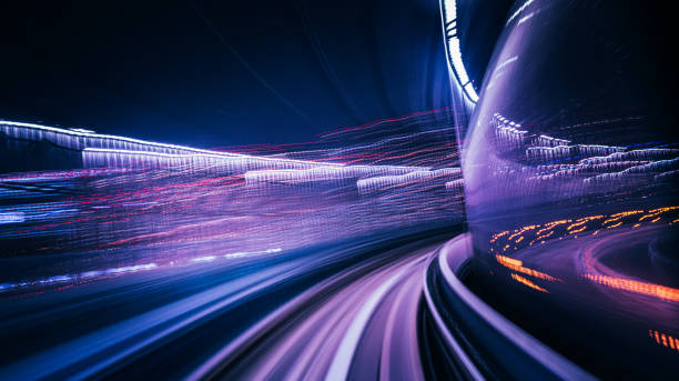 istock Futuristic High Speed Light Tail with Night City Background 1193048712