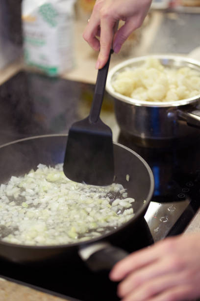 istock Chopped onions fried on a plate 1193049278