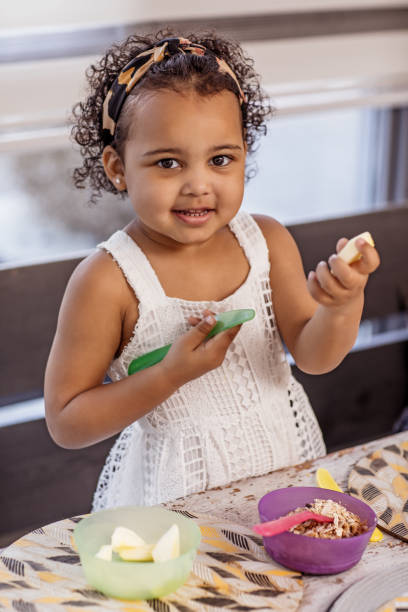 istock Ethnic family breakfast with children 1193049931