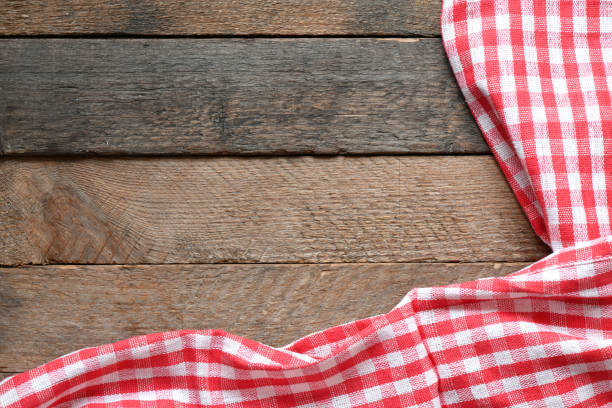 istock Table cloth on wooden table rustic background. Copy space for text, mock up. High resolution photography ready as a kitchen background. 1193050013