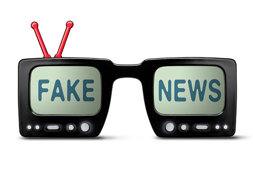 Fake news. Tv glasses. Photo with clipping path.