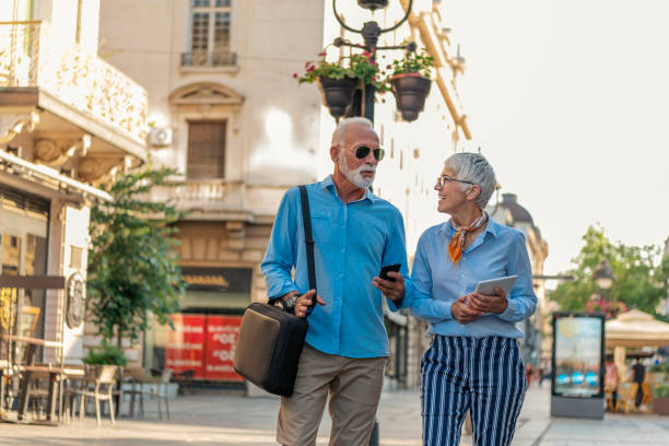 istock Senior Couple Exploring the City 1193058303