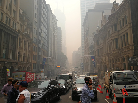 Smoke haze covered over business buildings in city from uncontrolled bush fire, caused Sydney's air quality plummet, Australia : 10/12/2019
