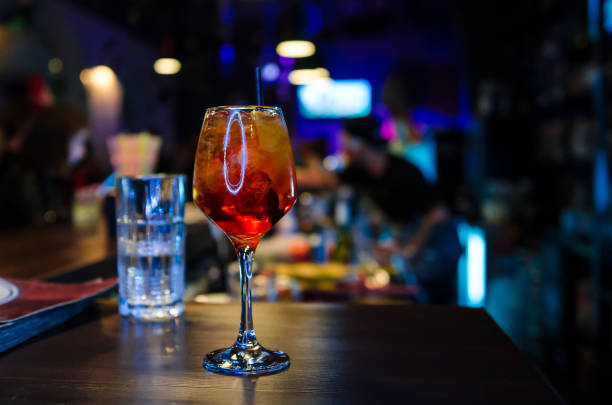 istock Glass of Spritz cocktail on the table in restaurant 1193064154