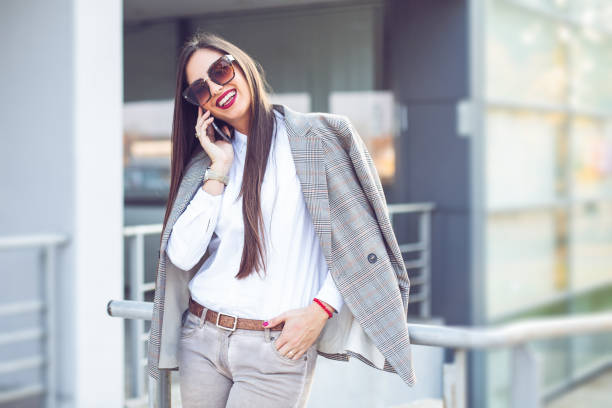 istock Business woman talking on smart phone. 1193064729