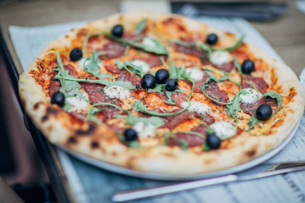 istock Tasty pizza on the table 1193066253