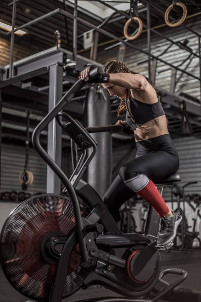 istock Female fighter in a black gym 1193069109