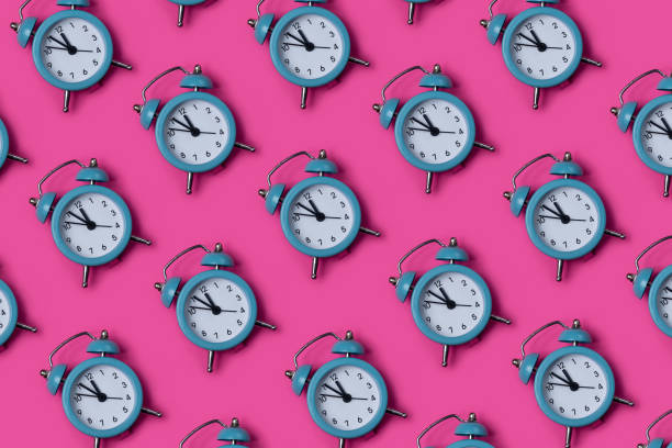 istock Pattern of alarm clocks. Top view. 1193070577