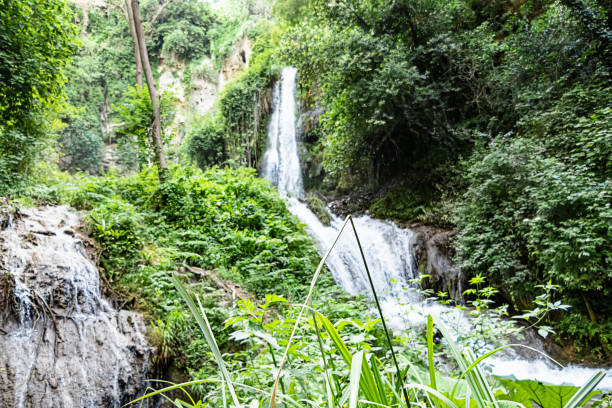 istock Waterfalls Running Through the Rocky Hill 1193070801