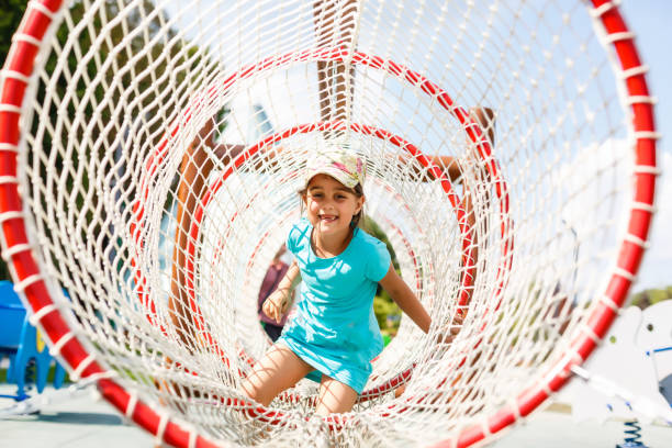 istock the girl on the playground 1193072014