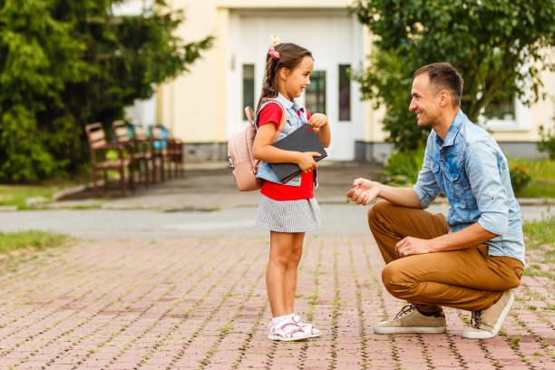 istock Loving daddy look at little adorable daughter feeling love, profile faces side view, deep devotion warm relationships, love care, closest person, fathers day concept 1193073488
