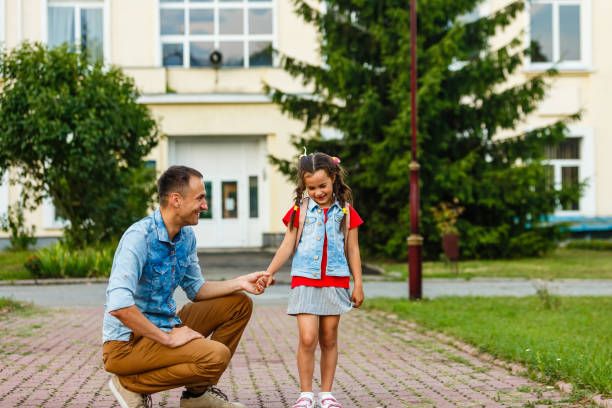 istock Loving daddy look at little adorable daughter feeling love, profile faces side view, deep devotion warm relationships, love care, closest person, fathers day concept 1193073591