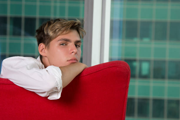 istock Young attractive guy is resting on the couch. 1193075306