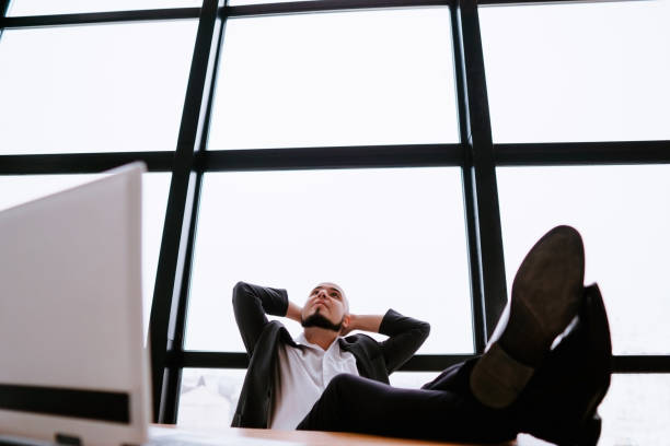 istock Successful businessman satisfied and relaxed 1193076554