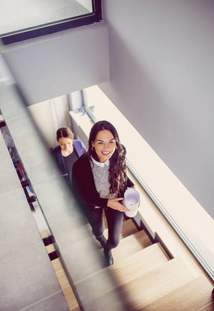istock Beautiful business woman going to work 1193077146