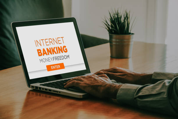 istock Laptop computer with internet banking website in the screen. 1193077166