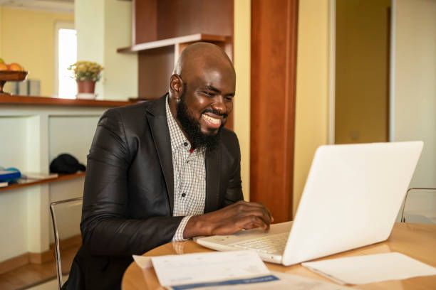 istock Mature African Freelancer is Working at Home Office 1193077186