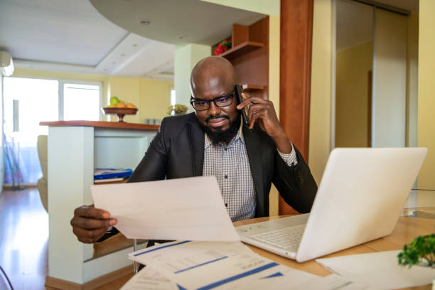 istock Mature African is Working at Home Office 1193077273