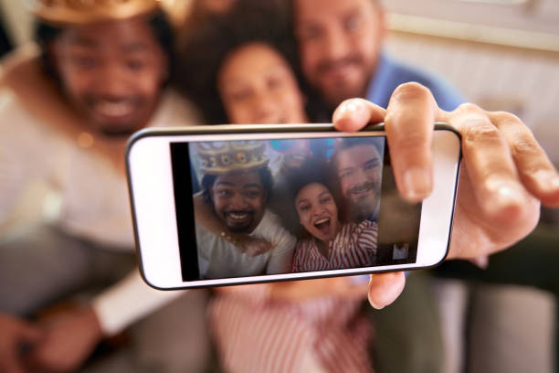istock Group of people making selfie 1193077975