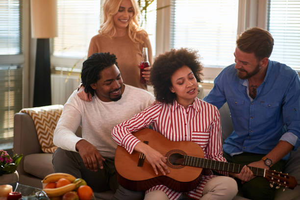 istock Woman playing guitar 1193078503