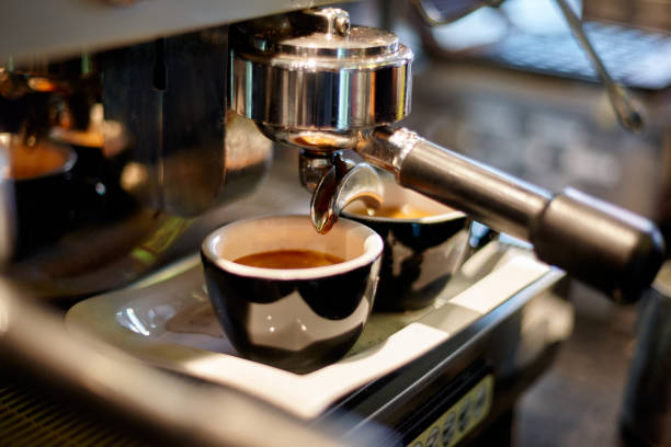 Making coffee in a professional coffee machine in a coffee shop