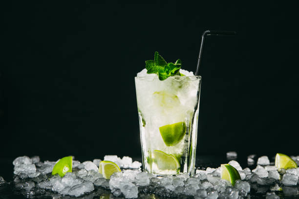 istock Mojito cocktail on black background 1193079898