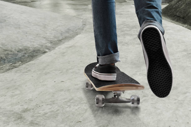 istock Skateboarder skateboarding at skate park 1193080904