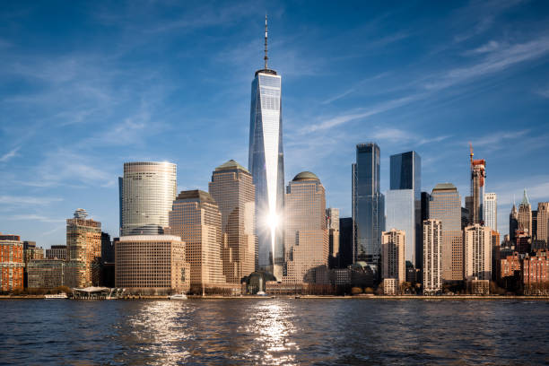 Lower Manhattan skyline on a sunny day Lower Manhattan skyline on a sunny day. one world trade center photos stock pictures, royalty-free photos & images