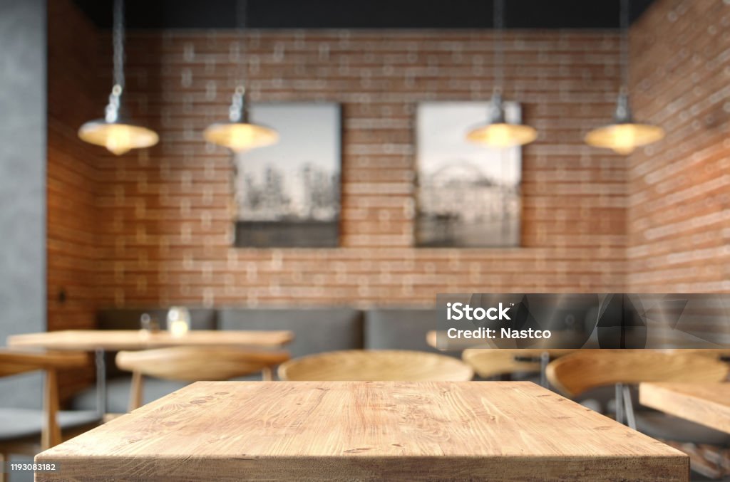 Empty tabletop in the coffe shop Empty tabletop in the coffe shop over defocused background with copy space Restaurant Stock Photo