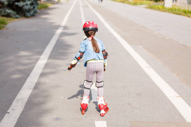 istock little girl rollerblading along the tracks 1193091545