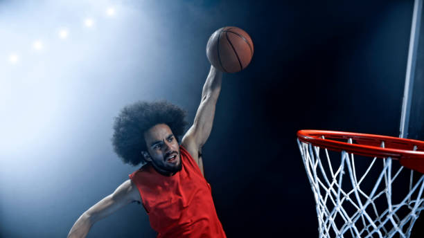 istock Young man playing basketball 1193091688