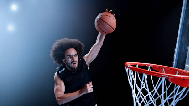 istock Young man playing basketball 1193091691
