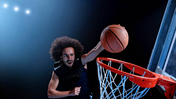 istock Young man playing basketball 1193091693