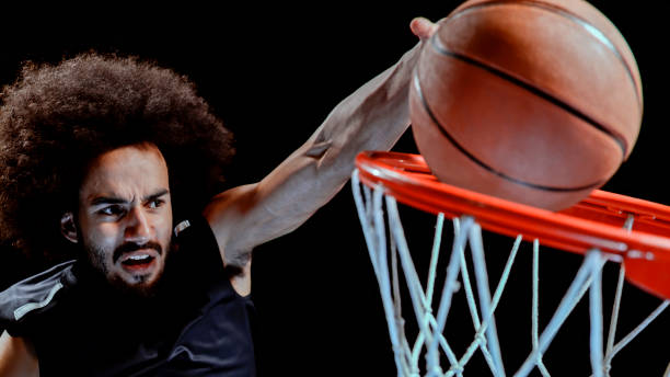 istock Young man playing basketball 1193091697