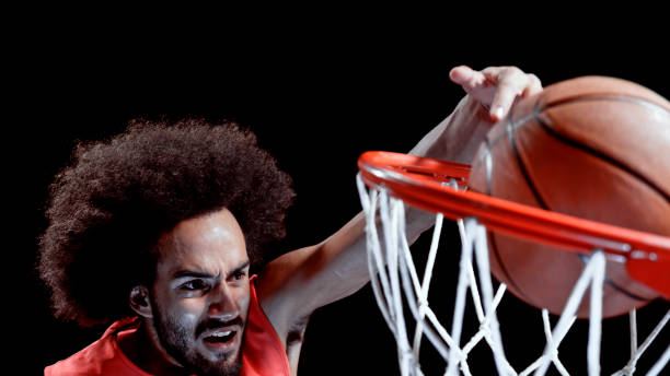 istock Young man playing basketball 1193091699