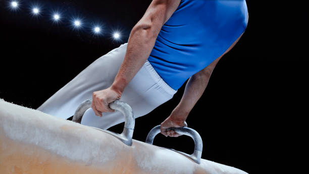 istock Young man performing on pommel horse 1193091715