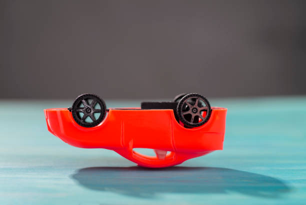 istock The car is upside down and in crisis 1193100829
