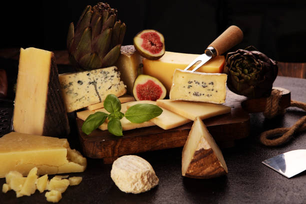 istock Different sorts of cheese. Cheese platter with different cheese and spice 1193101684