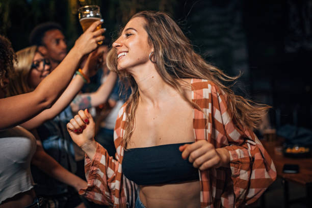 istock Beautiful lady dancing at the party 1193102263