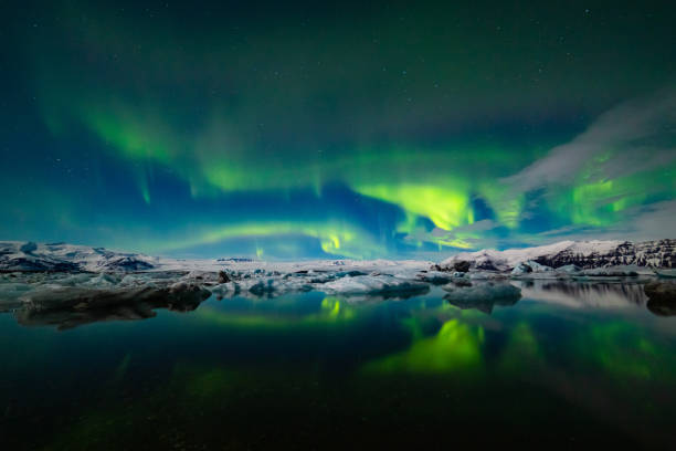 istock Aurora Borealis over a glacier lagoon in Iceland 1193107243