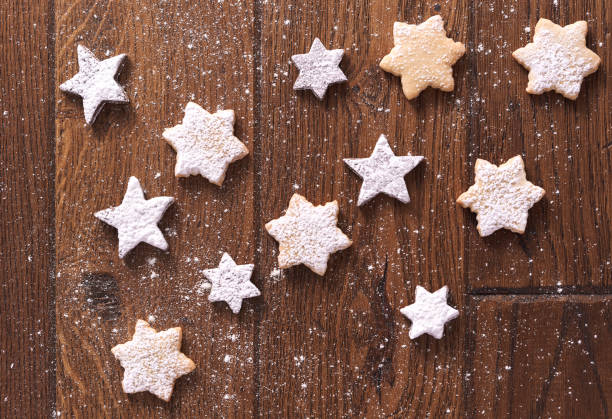 istock Star shaped gingerbread cookies with powdered sugar 1193108653