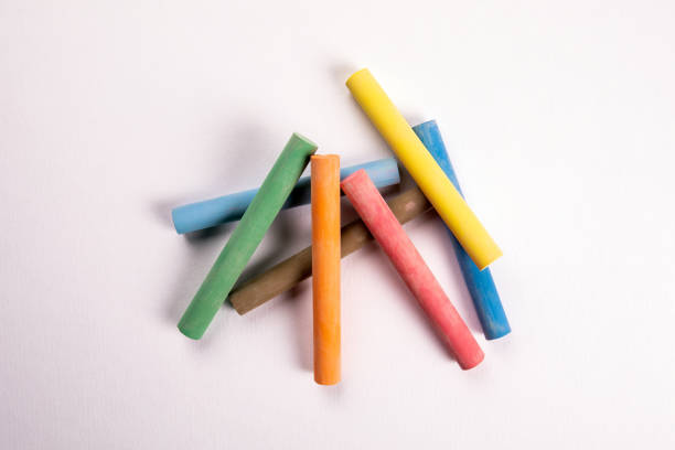 istock Close up of multicolor chalk on white 1193108882
