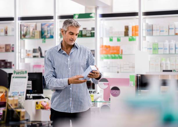 istock Customer buying medicines at pharmacy store 1193113004
