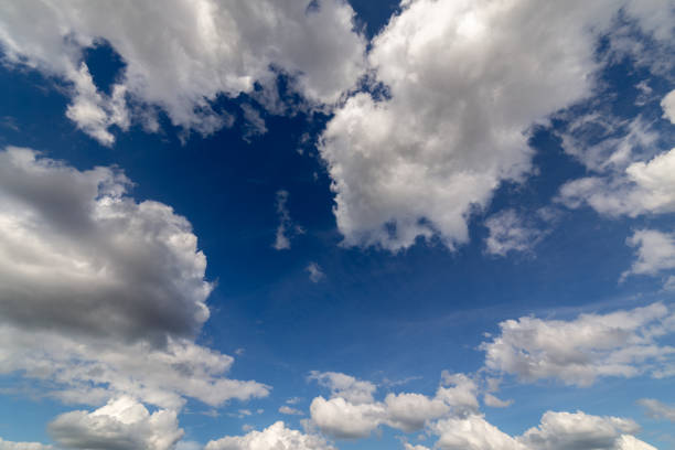 istock Regular spring clouds on blue sky at daylight in continental europe. Close shot with wide angle lens without filter. 1193114585