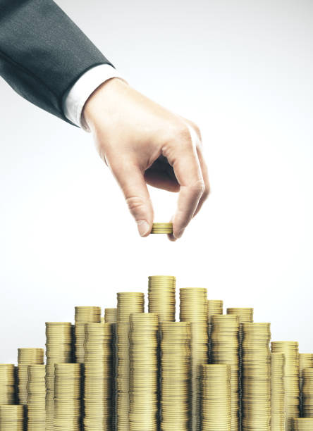 istock Hand businessman put coin 1193115593
