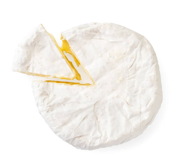 istock Cheese with white mold, cut a triangle on a white background. The view of top. 1193117059