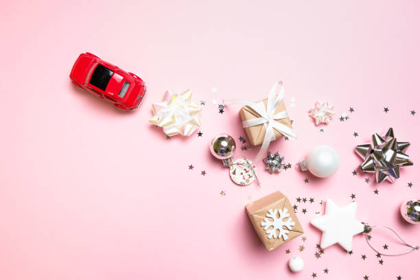 istock red children's car on a pink background 1193121659